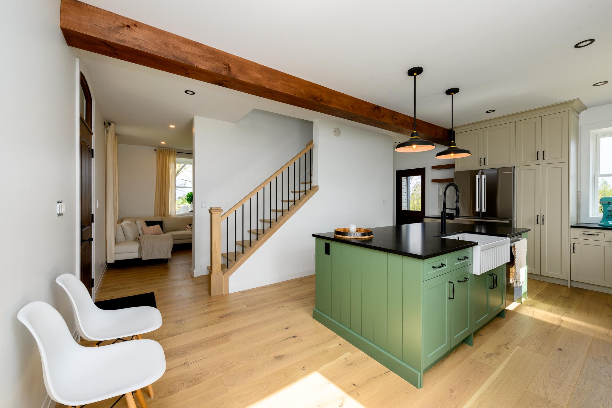 custom cabinets, engineered hardwood floors, faux beam, farm house, dark countertops